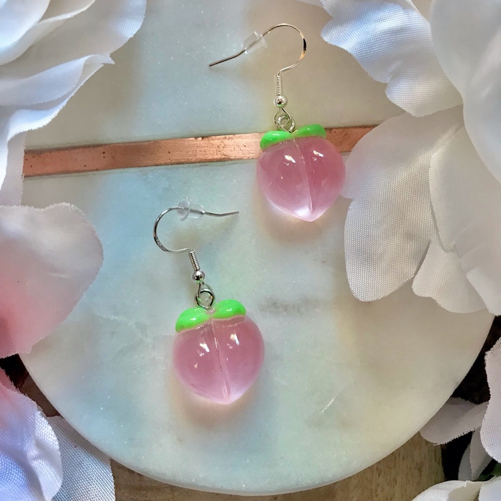 Glittery or Matte peach emoji 🍑 dangly silver earrings.